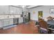Modern kitchen with gray cabinets and stainless steel appliances at 516 Arthur Sw St, Atlanta, GA 30310