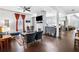 Open living room with stone fireplace and hardwood floors at 516 Arthur Sw St, Atlanta, GA 30310