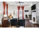 Bright living room with fireplace, hardwood floors, and comfortable seating at 516 Arthur Sw St, Atlanta, GA 30310