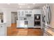 Modern kitchen featuring stainless steel appliances and white shaker cabinets at 8120 Tynecastle Dr, Atlanta, GA 30350