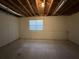 Unfinished basement with a window for light at 90 Lake Avalon Ct, Dallas, GA 30157