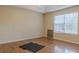 Bedroom with a large window and wood flooring at 90 Lake Avalon Ct, Dallas, GA 30157