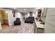 Finished basement with home theater seating, wet bar, recessed lighting, and plank flooring at 1030 Lake Haynes Ne Dr, Conyers, GA 30012