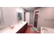 Bathroom features a double vanity, shower with glass door, and a tub; with wood floors and light fixtures at 1030 Lake Haynes Ne Dr, Conyers, GA 30012