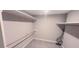 A walk-in closet featuring rod for hangers and shelving at 1030 Lake Haynes Ne Dr, Conyers, GA 30012