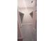 Empty walk-in closet with shelving, carpeting, and lighting at 1030 Lake Haynes Ne Dr, Conyers, GA 30012