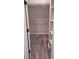 A walk-in closet featuring rods for hanging clothes and shelving at 1030 Lake Haynes Ne Dr, Conyers, GA 30012