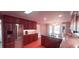 Kitchen with cherry cabinets, granite countertops, and stainless steel appliances at 1030 Lake Haynes Ne Dr, Conyers, GA 30012