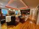 Spacious living room with hardwood floors and a stone fireplace at 1030 Lake Haynes Ne Dr, Conyers, GA 30012