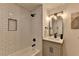Updated bathroom with shower/tub combo and subway tile at 2490 Woodfern Ct, Marietta, GA 30062