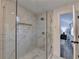Spa-like bathroom with a frameless glass shower at 2490 Woodfern Ct, Marietta, GA 30062