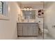 Elegant bathroom with gray vanity and marble shower at 2490 Woodfern Ct, Marietta, GA 30062