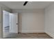 Bright bedroom with ceiling fan and grey vinyl flooring at 2490 Woodfern Ct, Marietta, GA 30062