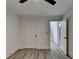 Bedroom with ceiling fan and access to upper level at 2490 Woodfern Ct, Marietta, GA 30062