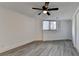 Basement bedroom with wood-look floors and window at 2490 Woodfern Ct, Marietta, GA 30062
