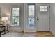 Bright entryway with hardwood floors, and white door at 2490 Woodfern Ct, Marietta, GA 30062