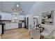 Modern kitchen with white cabinets, stainless steel appliances and breakfast nook at 2490 Woodfern Ct, Marietta, GA 30062