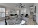 Spacious living room with hardwood floors, ceiling fan, and view to dining area at 2490 Woodfern Ct, Marietta, GA 30062