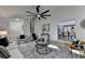 Open concept living room with hardwood floors, and views into dining area at 2490 Woodfern Ct, Marietta, GA 30062