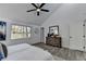 Spacious main bedroom with vaulted ceiling and large window at 2490 Woodfern Ct, Marietta, GA 30062