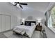 Spacious main bedroom with vaulted ceiling and large window at 2490 Woodfern Ct, Marietta, GA 30062