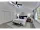 Spacious main bedroom with vaulted ceiling and large window at 2490 Woodfern Ct, Marietta, GA 30062
