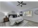 Spacious main bedroom with vaulted ceiling and large window at 2490 Woodfern Ct, Marietta, GA 30062
