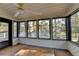 Sunroom with wooden floors and multiple windows at 2490 Woodfern Ct, Marietta, GA 30062