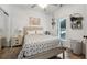 Cozy bedroom with light wood furniture and a ceiling fan at 7108 Roselake Cir, Douglasville, GA 30134