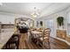 Kitchen and breakfast area with hardwood floors and archway to living room at 7108 Roselake Cir, Douglasville, GA 30134