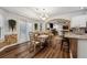 Bright dining room with access to the backyard and kitchen at 7108 Roselake Cir, Douglasville, GA 30134