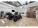 Spacious garage with tile flooring and extra storage at 7108 Roselake Cir, Douglasville, GA 30134