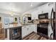 Updated kitchen with granite countertops, stainless steel appliances and breakfast bar at 7108 Roselake Cir, Douglasville, GA 30134