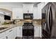 Modern kitchen featuring stainless steel appliances and granite countertops at 7108 Roselake Cir, Douglasville, GA 30134