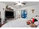 Main bedroom with a painted accent wall and plush bedding at 7108 Roselake Cir, Douglasville, GA 30134