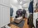 Large walk-in closet with ample hanging space and shelving at 7108 Roselake Cir, Douglasville, GA 30134