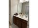 Bathroom with single vanity and large mirror at 1797 Weatherbrook Cir, Lawrenceville, GA 30043