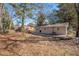 Private backyard with patio and mature trees at 3519 Adkins Nw Rd, Atlanta, GA 30331