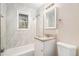 Clean bathroom with granite vanity and tiled shower/tub at 3519 Adkins Nw Rd, Atlanta, GA 30331