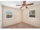 Spacious bedroom with carpet flooring and ceiling fan at 3519 Adkins Nw Rd, Atlanta, GA 30331