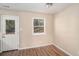 Small dining area with hardwood floors and access to the backyard at 3519 Adkins Nw Rd, Atlanta, GA 30331