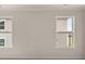 Bedroom with neutral walls and two large windows at 7174 Linden Dr, South Fulton, GA 30349