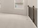 Bright bedroom with neutral carpeting and large window at 7174 Linden Dr, South Fulton, GA 30349