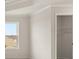 Bright bedroom with a large window and closet at 7174 Linden Dr, South Fulton, GA 30349
