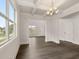 Bright dining room with hardwood floors, recessed lighting and views to the living room at 7174 Linden Dr, South Fulton, GA 30349