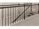 Elegant staircase with dark wood railings and balusters at 7174 Linden Dr, South Fulton, GA 30349