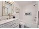 Modern bathroom with white subway tiles, a freestanding tub, and updated vanity at 668 Stokeswood Se Ave, Atlanta, GA 30316