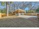 Spacious carport parked with two cars and surrounded by trees at 668 Stokeswood Se Ave, Atlanta, GA 30316