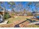 Spacious backyard with fire pit and room for recreation at 775 Holcombe Woods Ct, Auburn, GA 30011