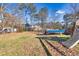 Boat and playset in large backyard at 775 Holcombe Woods Ct, Auburn, GA 30011